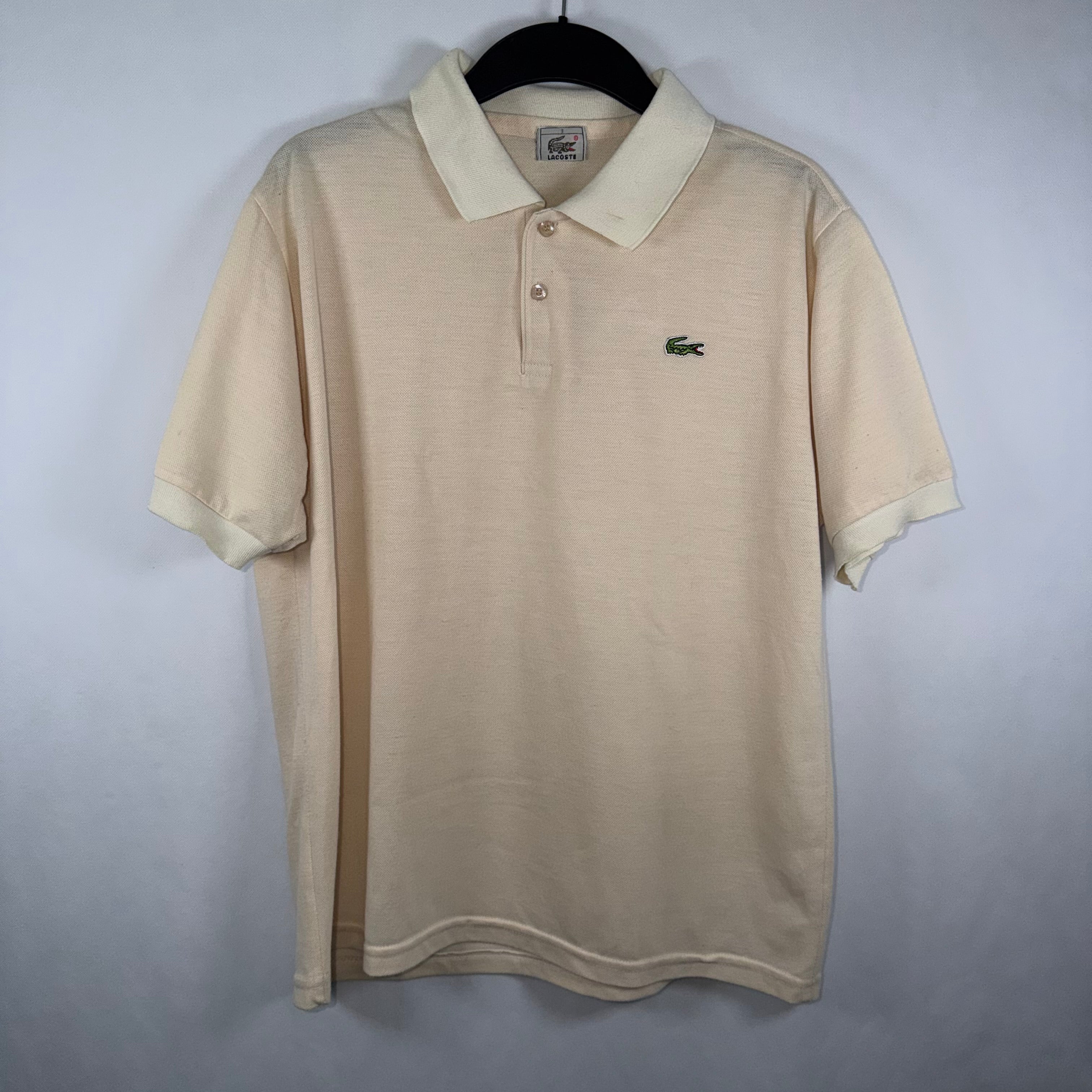 Polo Lacoste Crema Hombre